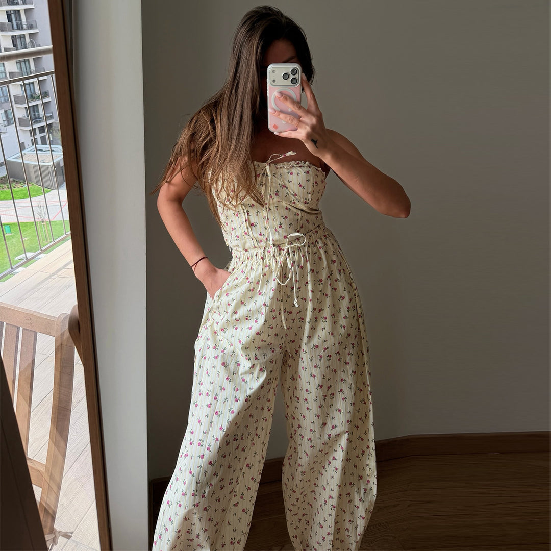 Dame jumpsuit med legende blomsterprint og elastisk taljebånd Skovae