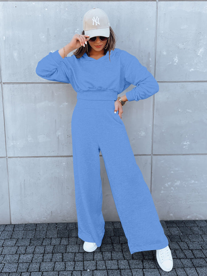 Kvinders afslappede jumpsuit med vidde ben og praktisk hætte Stilla