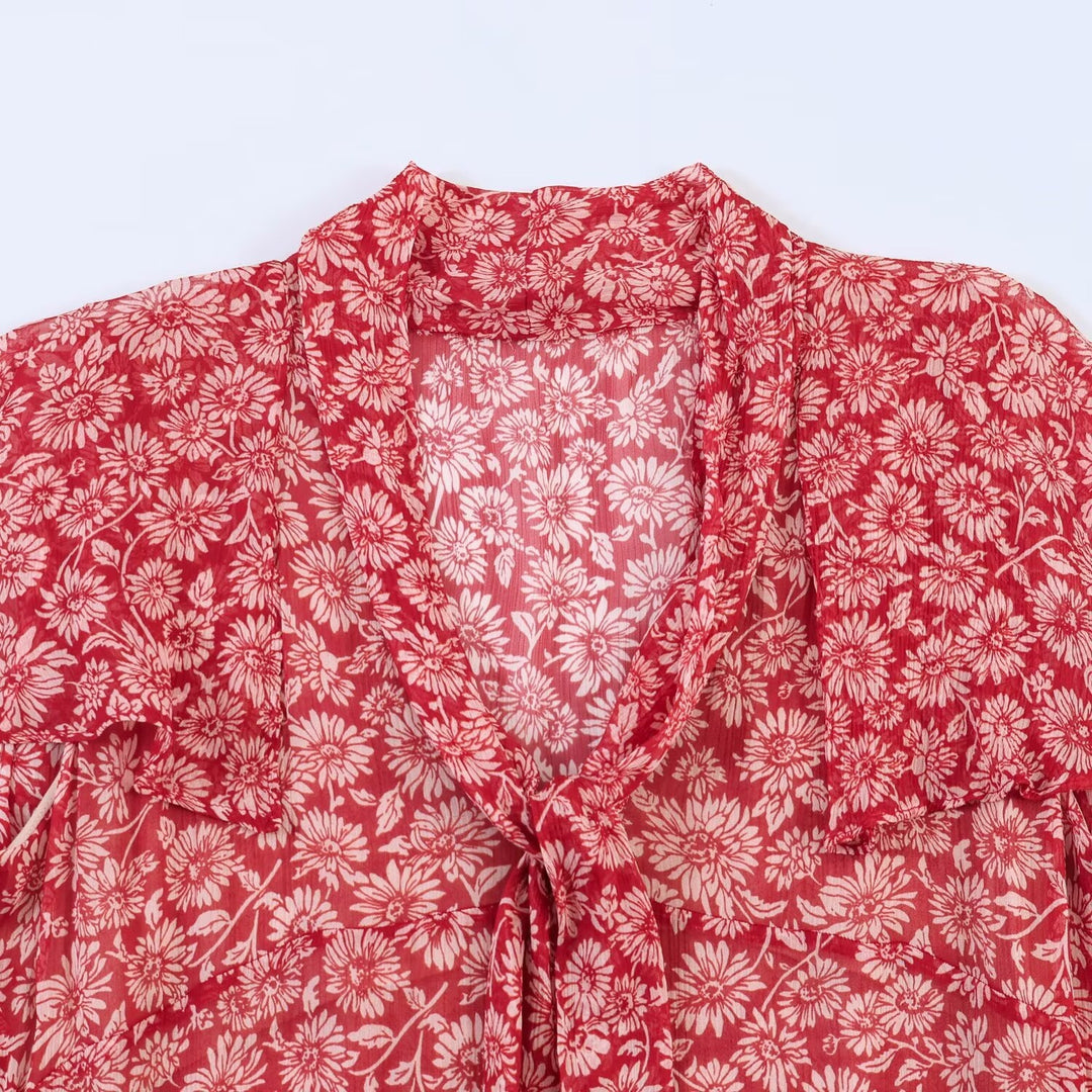 Dame maxikjole med florale detaljer og feminint snit Skovae