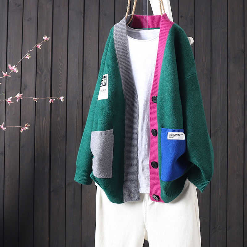 Kvinders oversized cardigan med farverige lommer og knapdetaljer Stilla