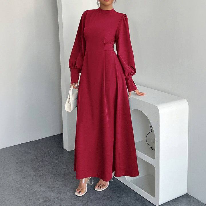 Dame maxikjole med elegante pufærmer og figursyet silhuet Stilla