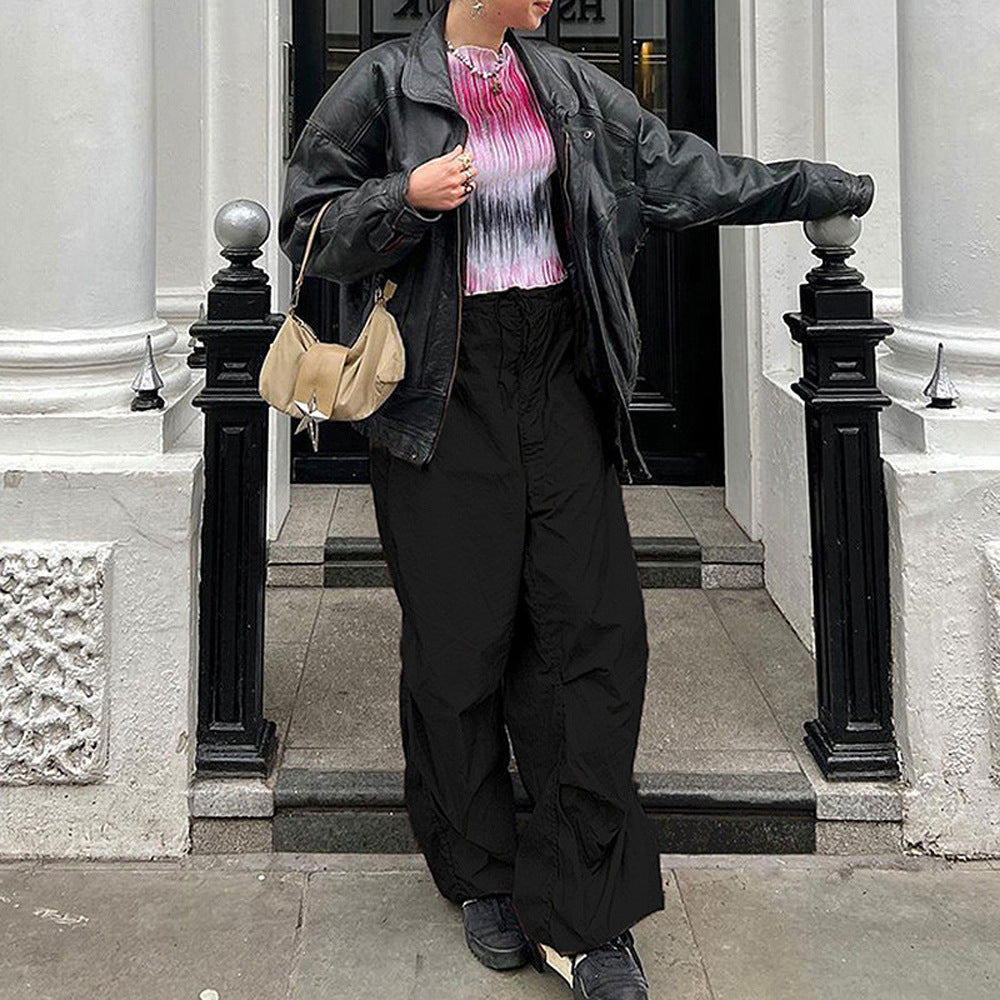 Dame brede sportbukser med elastisk talje og stilfulde kæde-detaljer Stilla