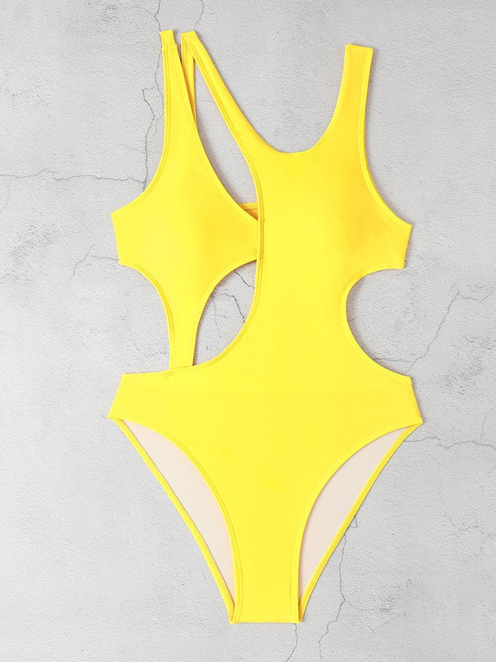 Dame én-delt badedragt med innovativt cut-out-design og sporty stropper Stilla