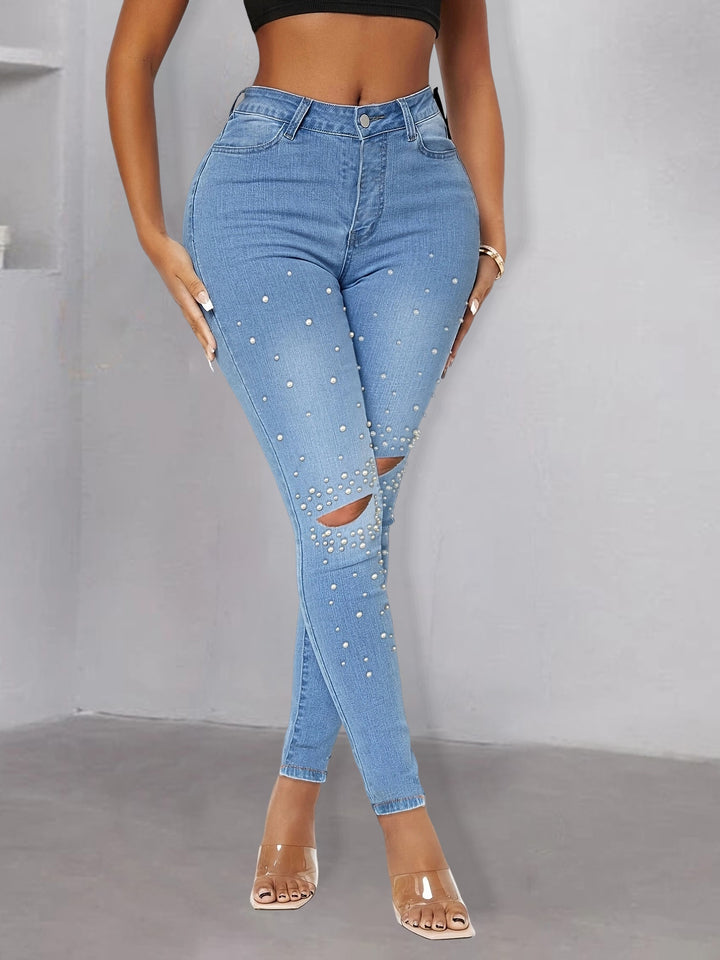 Dame Skinny Jeans med dekorative perleudsmykninger og moderne revnedetaljer Stilla