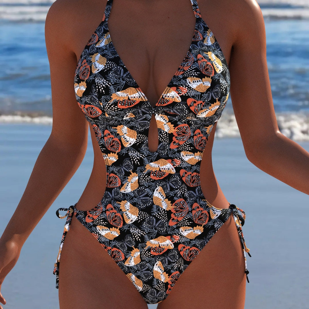 Dame Énse-piece badedragt med floral cut-out-design og justerbare bindebånd Skovae