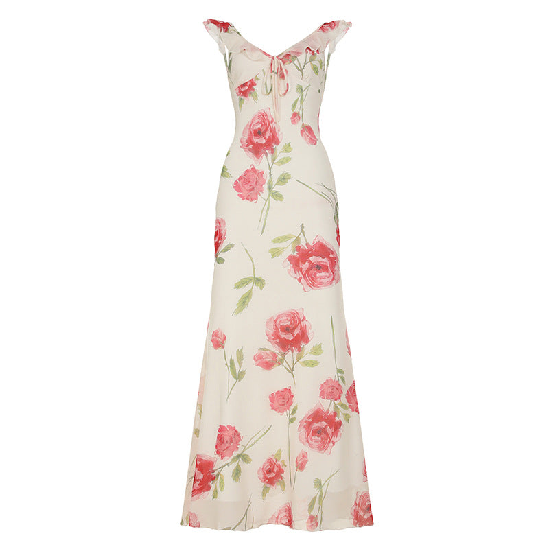Dame maxikjole med blomster cut-out og fine spaghetti stropper Skovae