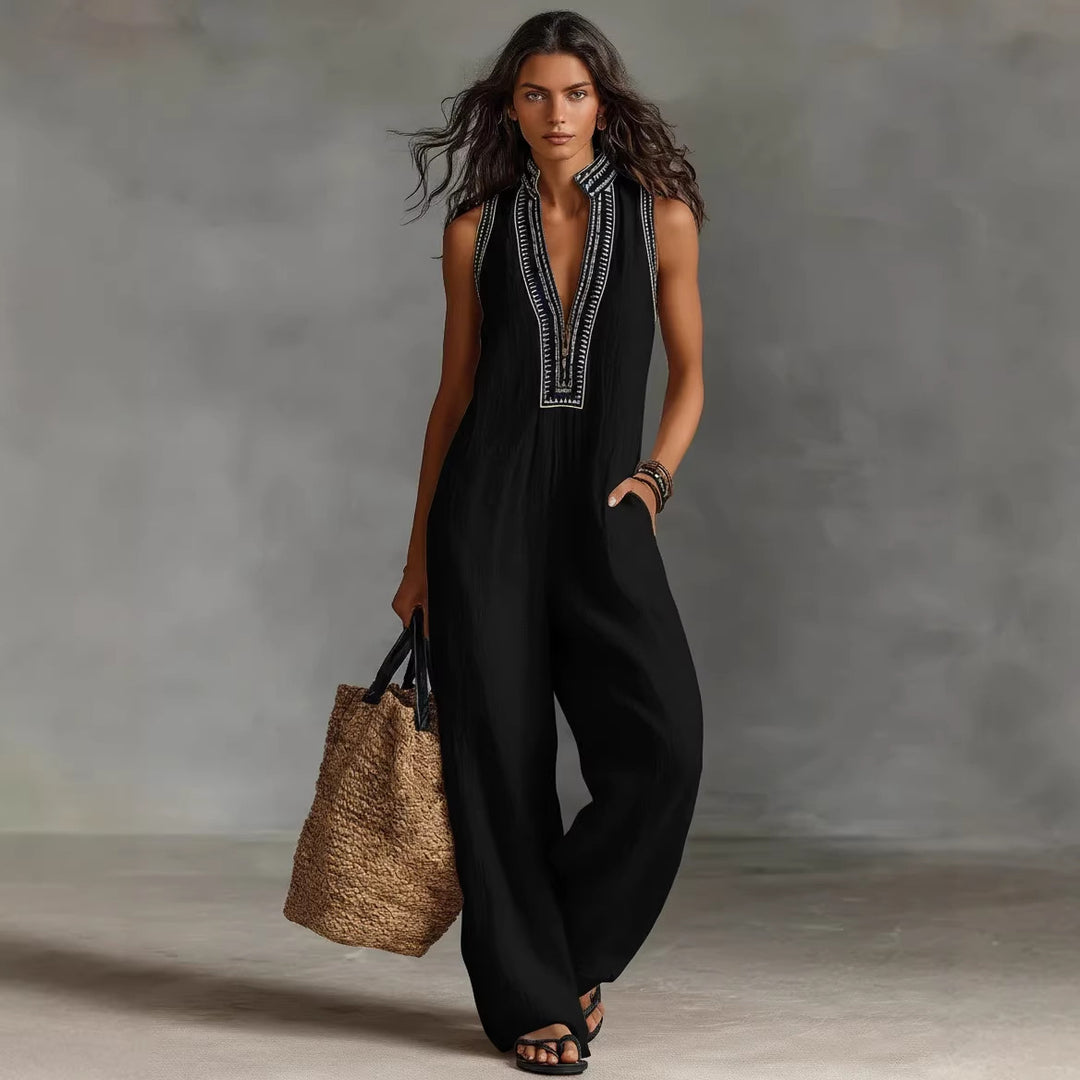 Dame luftig jumpsuit med elegant V-halsudskæring og broderet krave Skovae
