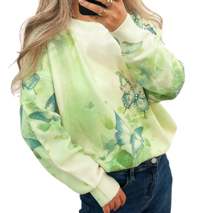 Damer strikket pullover med glitrende sommerfugleapplikationer Stilla