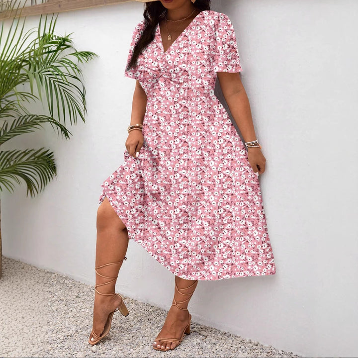 Dame Midi-kjole med blomsterprint og flattering slids Skovae