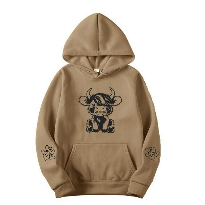 Kvindernes hætte sweatshirt med charmerende kvægmotiv og praktiske kængurulommer Skovae