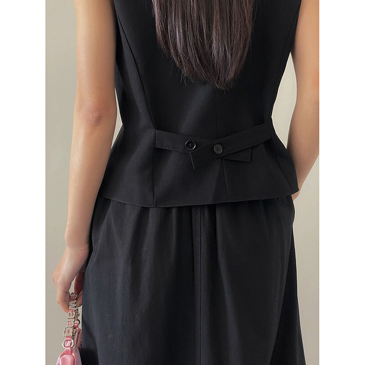 Dame flot vest med dekorativ knapdetalje og elegant drapering Stilla