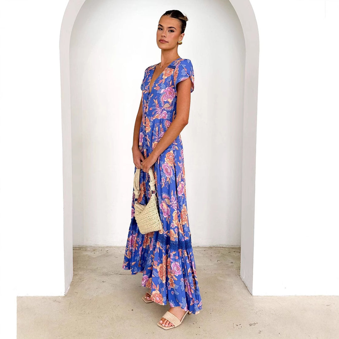 Dame maxi kjole med elegant V-udskæring og feminine flæse detaljer