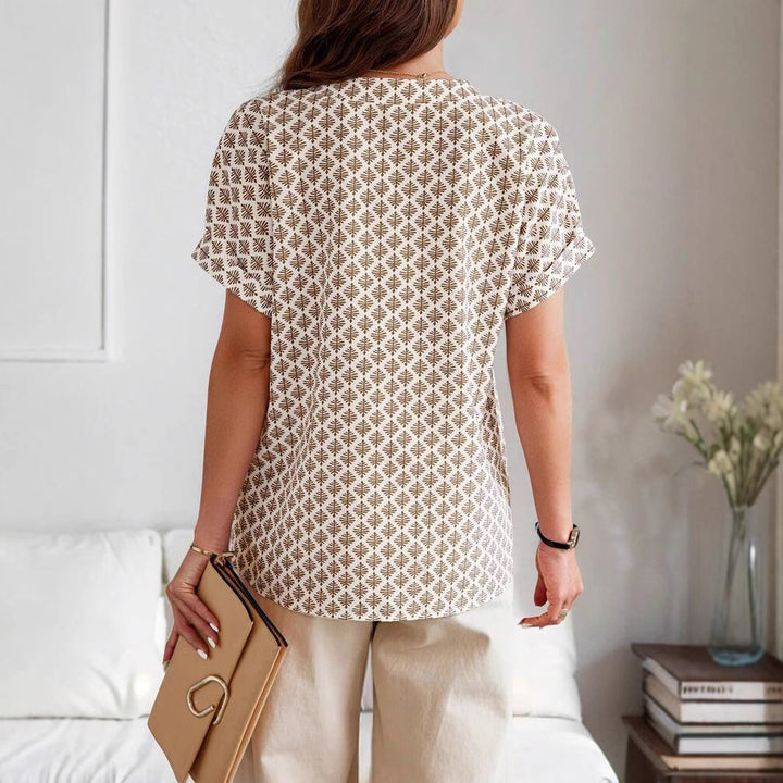 Dame kortærmet bluse med moderne geometrisk mønster Stilla