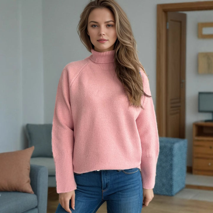 Damer elegant turtleneck sweater med struktureret strikdesign og glitrende accenter Stilla
