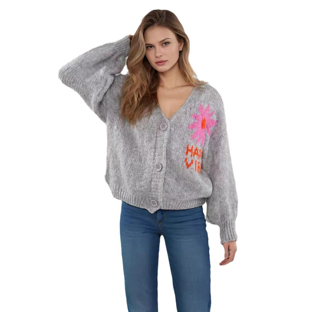 Damer legende cardigan med farverigt blomstermønster og store knapper Stilla