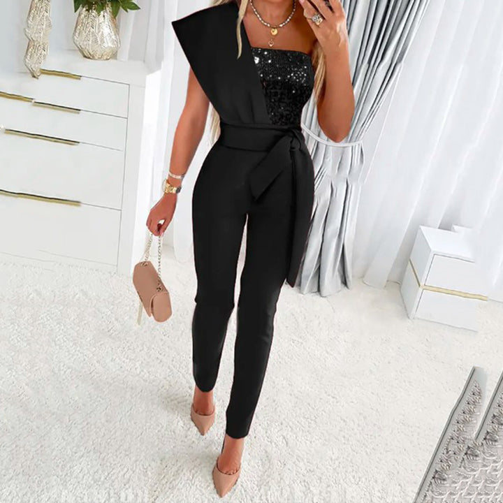 Dame elegant jumpsuit med asymmetrisk snit og glitrende overdel Stilla