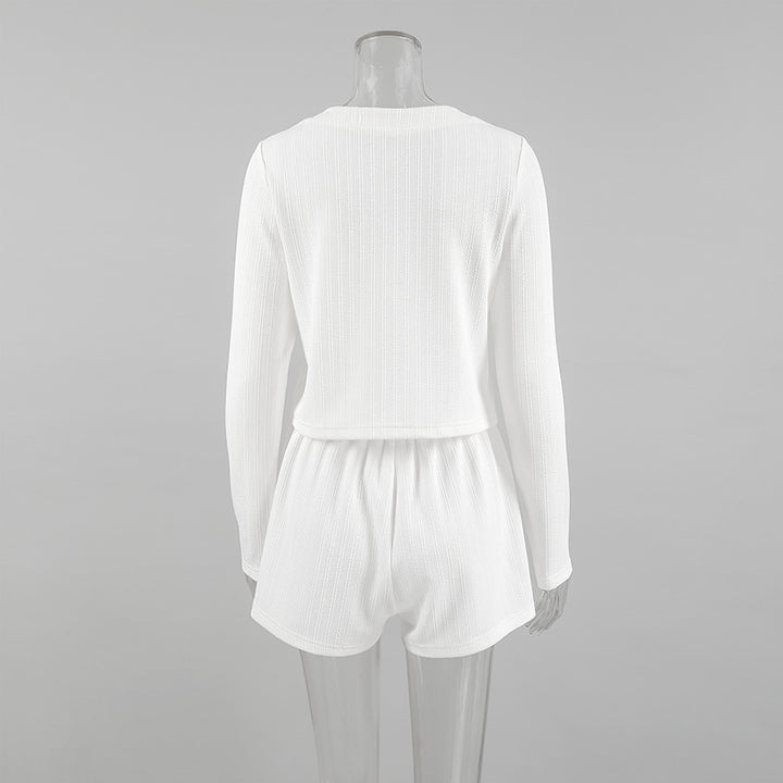 Dame pyjamasæt med langærmet Henley-overdel og løse shorts Stilla