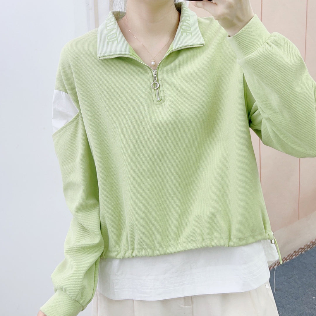 Dame sporty sweatshirt med kort lynlås og afslappet snit Stilla