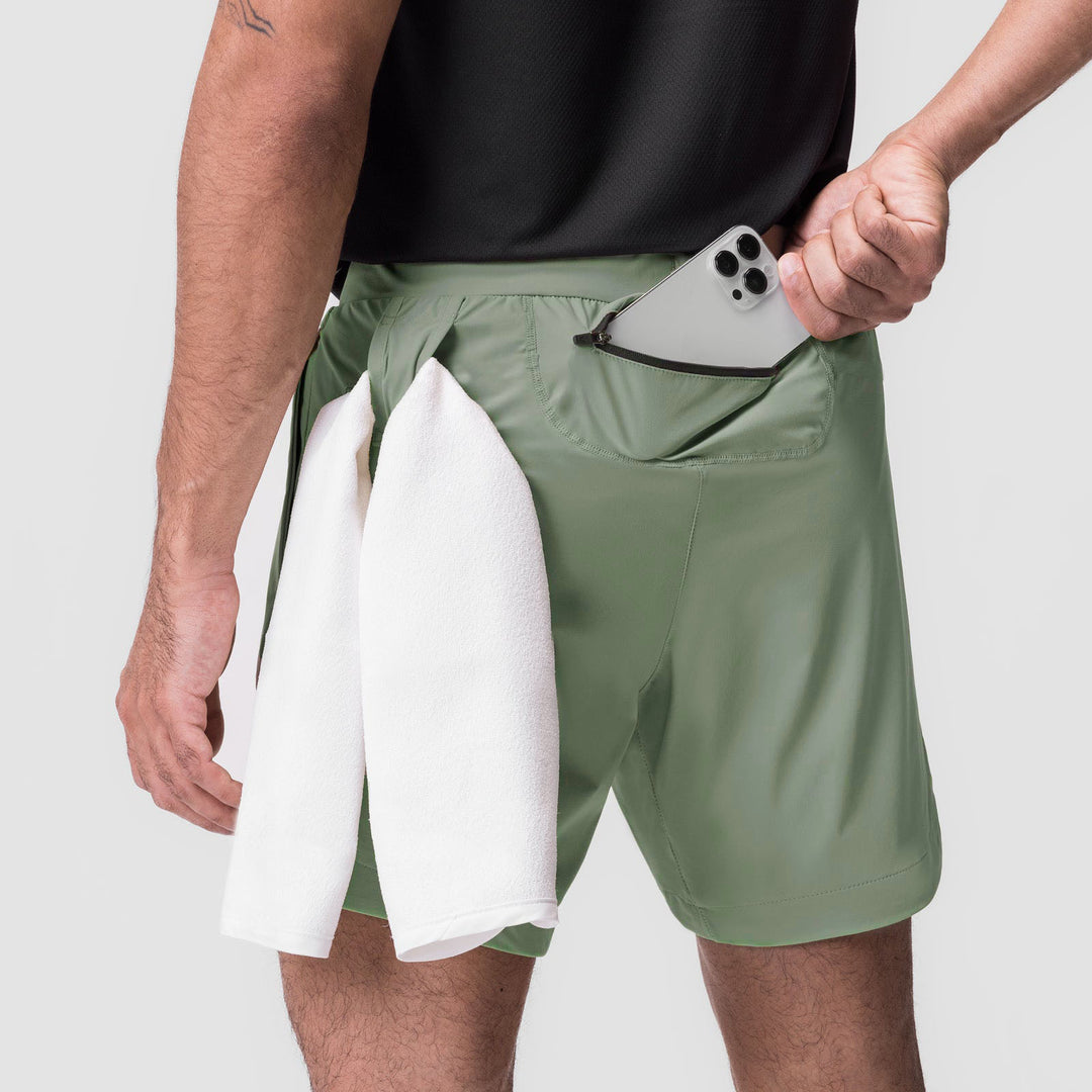 Herre multifunktionelle sportshorts med praktisk lomme-design Stilla