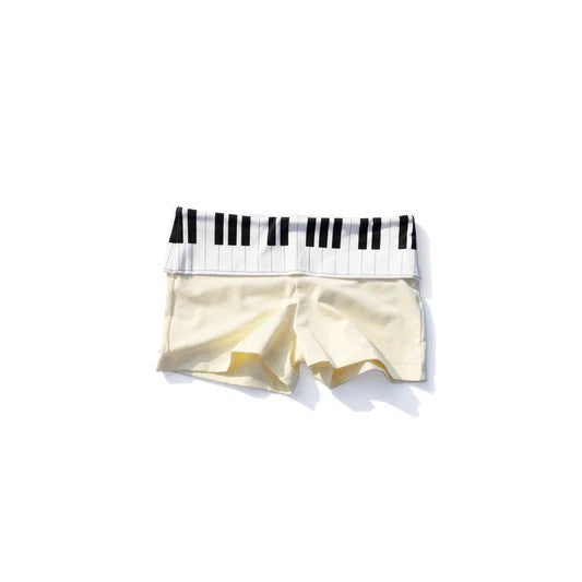 Dame polo shirt og shorts sæt med musikalsk design Skovae