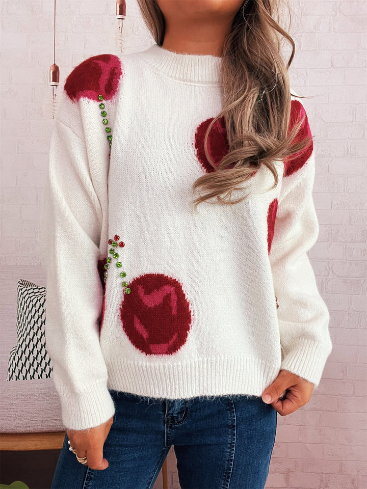 Kvinders hyggelige strikket sweater med blomsterapplikationer og glitrende accenter Stilla