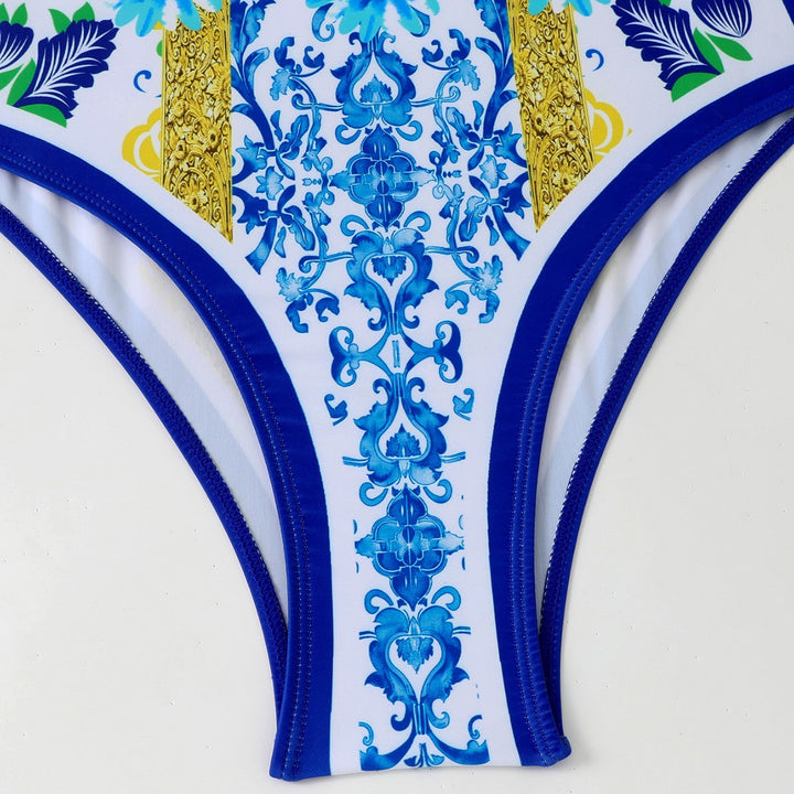 Dame ét par badebukser med elegant halterdesign og matchende pareo Stilla