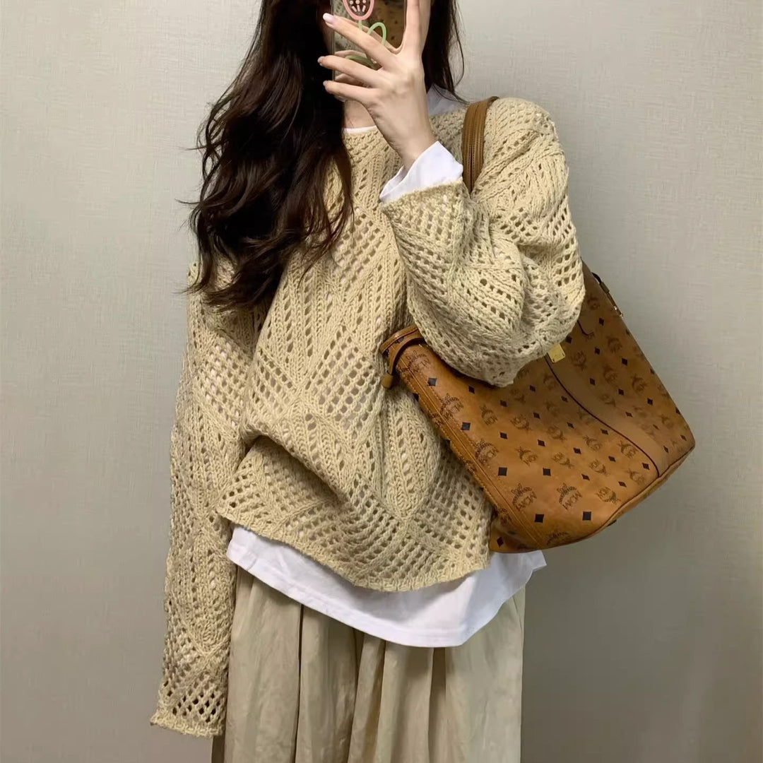Kvinders luftige strikket sweater i moderne netdesign Stilla