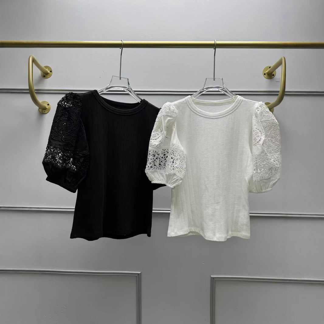 Damebluse med elegante ballonærmer og fine hæklerapplikationer Stilla