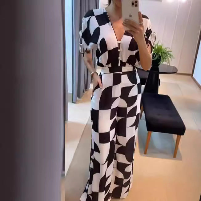 Dame Modet Jumpsuit med grafisk mønster og elegante ærmer Skovae