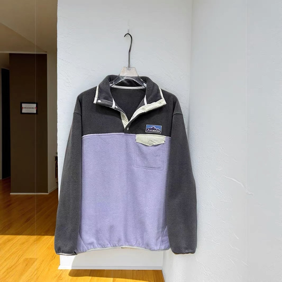 Women's fleece pullover with high collar and practical pockets Stilla