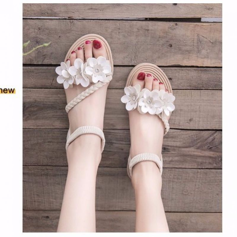 Dame nan legende Riemchensandal med fletede pyntebånd blomsterapplikationer og elastisk hælbånd Skovae