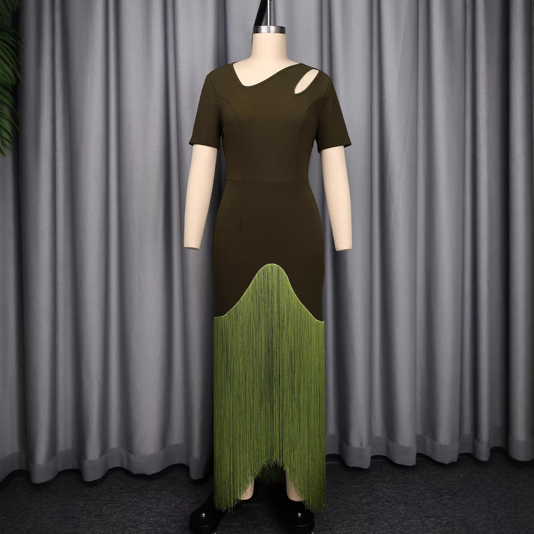 Dame maxikjole med asymmetrisk søm og elegant cut-out design Skovae