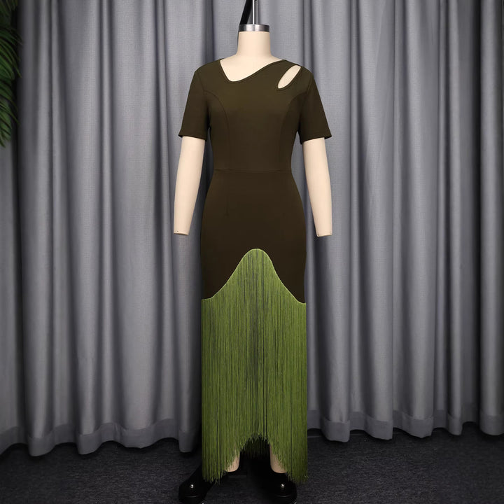 Dame maxikjole med asymmetrisk søm og elegant cut-out design Skovae