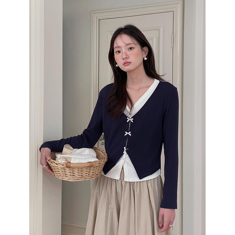 Dame cardigan med elegante knapdetaljer og V-udskæring Stilla