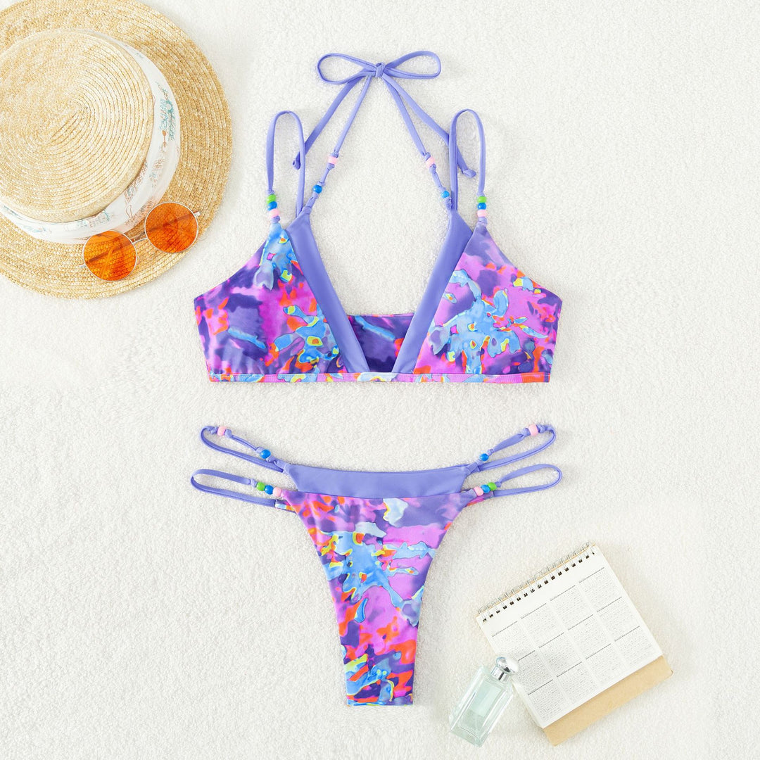 Dame bikini-sæt med spændende blomsterdesign og klassiske trekantkopper Stilla