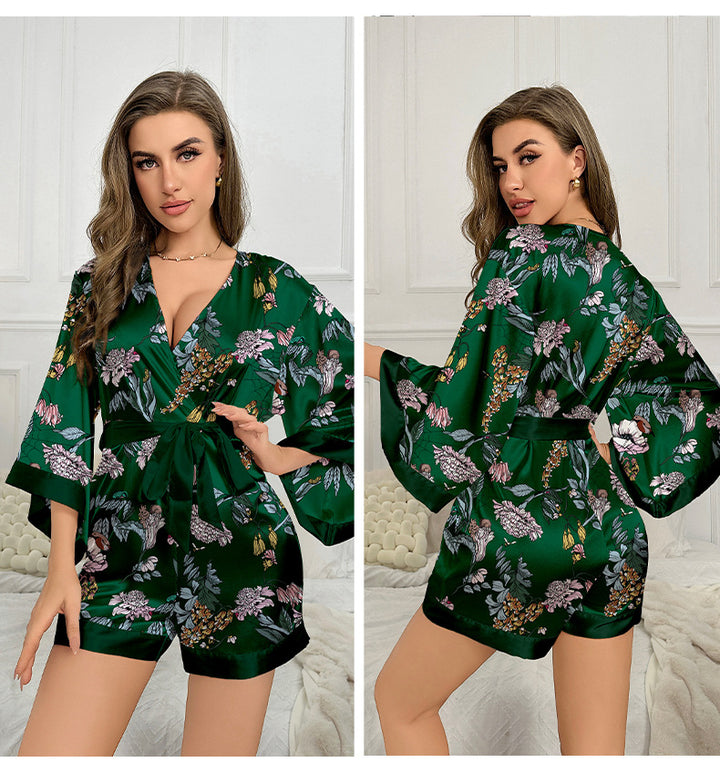 Dame Kimono-jumpsuit med blomstret design og svajende ærmer Stilla