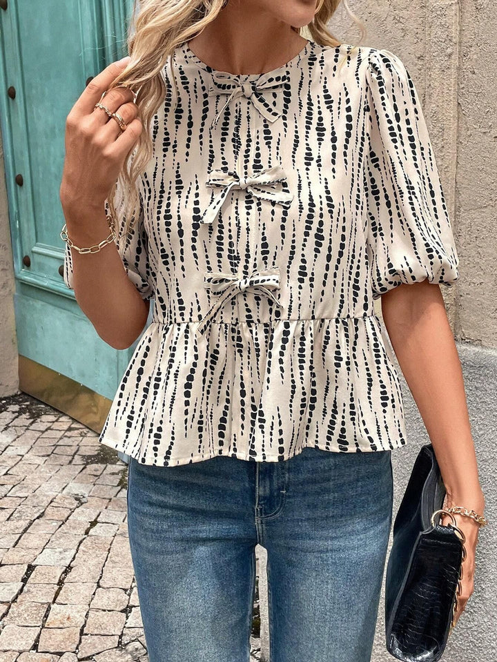 Dame Peplum-bluse med dekorative sløjfer Skovae