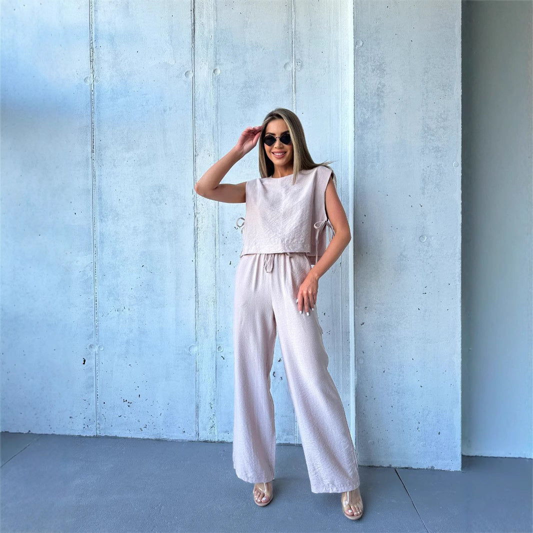 Kvinders bredbenede jumpsuit med lagdelt top og snøre Skovae
