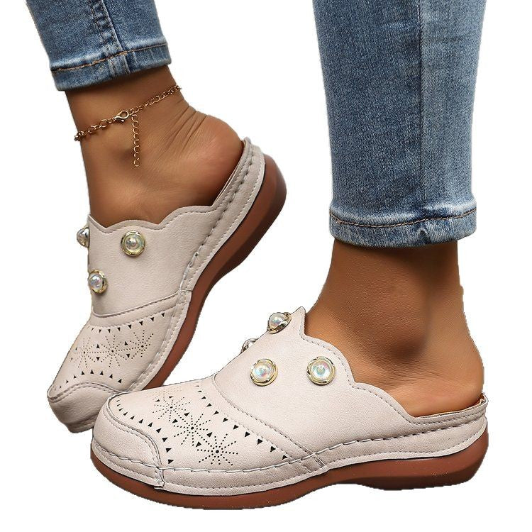 Dame Slip-On Clogs med Modeperforering og Elegante Dekordetaljer Stilla
