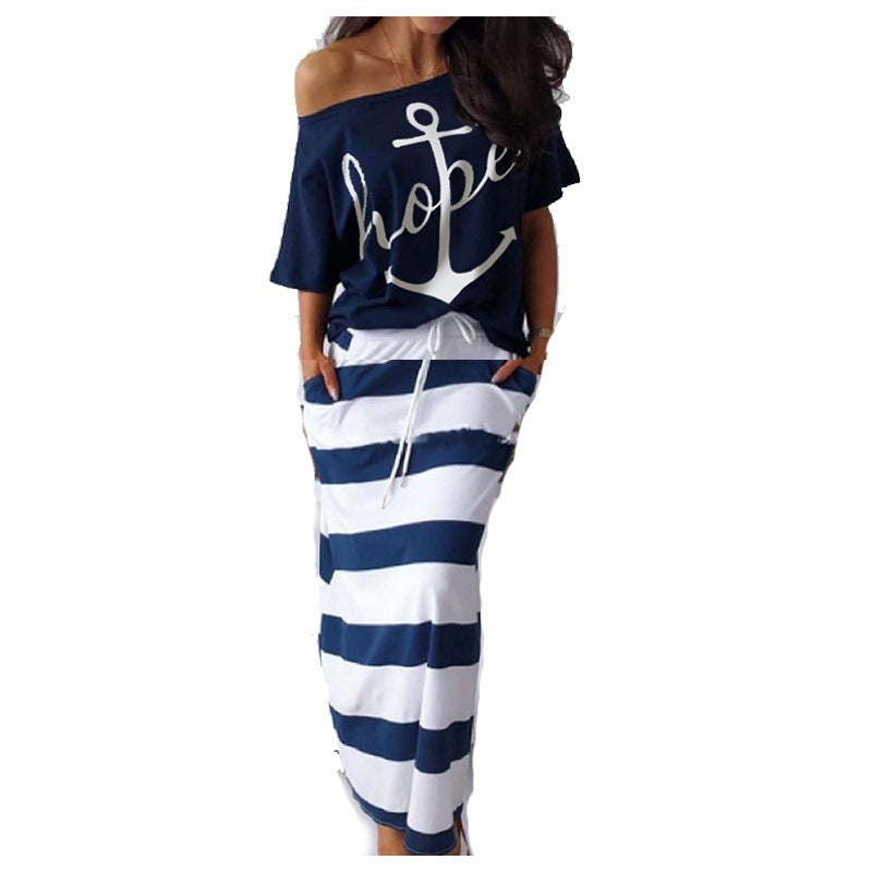 Kvindernes stilfulde strandoutfit med off-shoulder top og hoftelængde nederdel Stilla