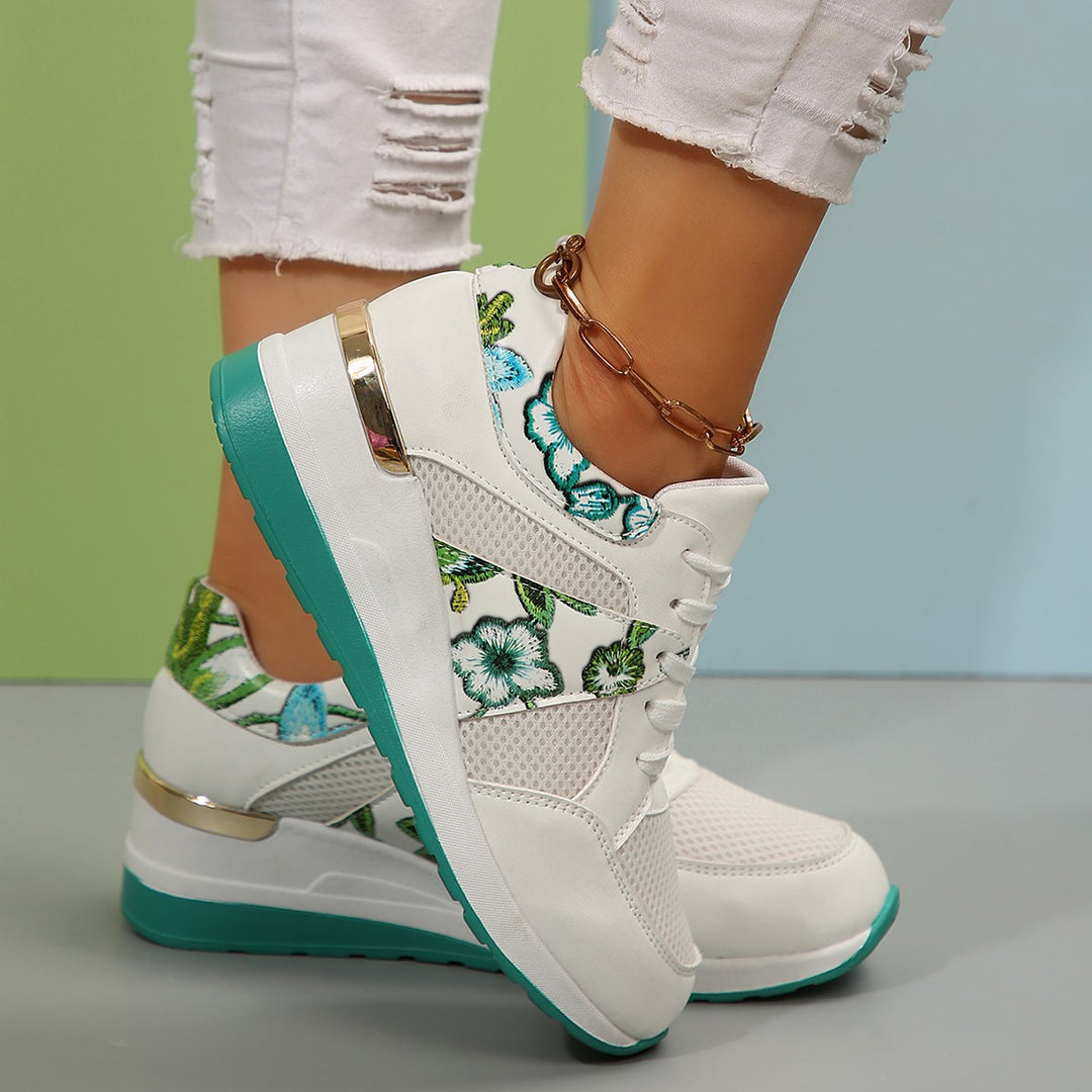 Dame Sneakers med luftig mesh-overflade og elegante florale accenter Stilla