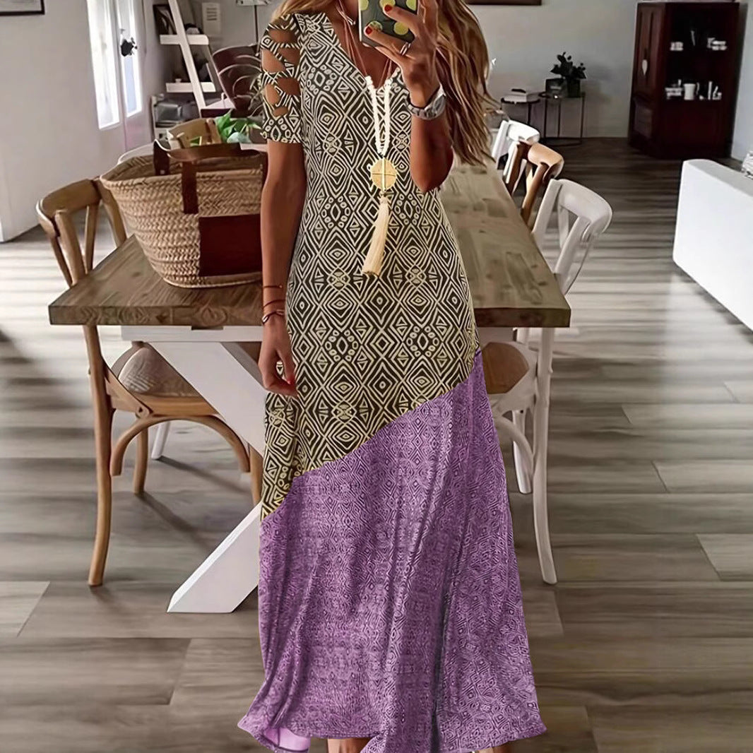 Dame Maxikjole med asymmetrisk snit og moderne cut-out-detaljer Stilla