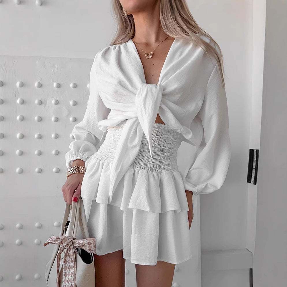 Damebluse med knude og flæse shorts Stilla