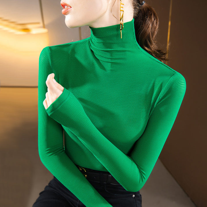 Dame Turtleneck-overdel med fin ribstruktur og elegant snit Stilla
