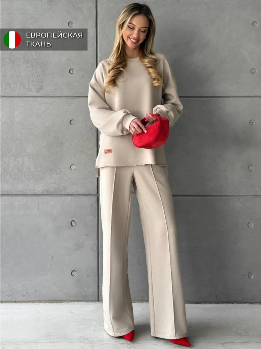 Damer elegant sweatsuit med løs pasform og stilfuld mærkedetalje Skovae