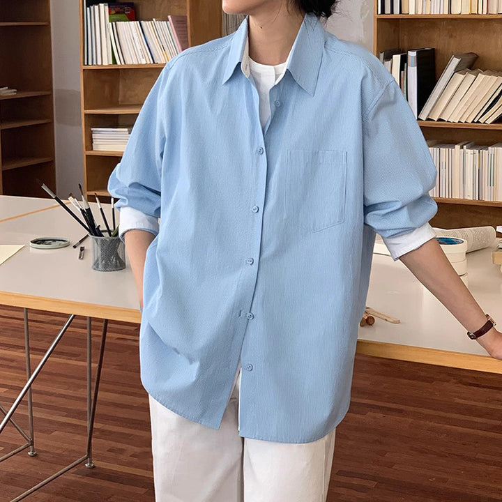 Dame oversized skjorte bluse i afslappet stil med praktiske lommer Stilla
