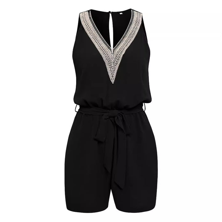 Dame jumpsuit med spidse detaljer og talje knude Stilla