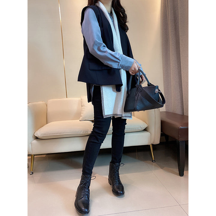 Dame elegant vest med asymmetrisk snit og praktiske lommer Stilla