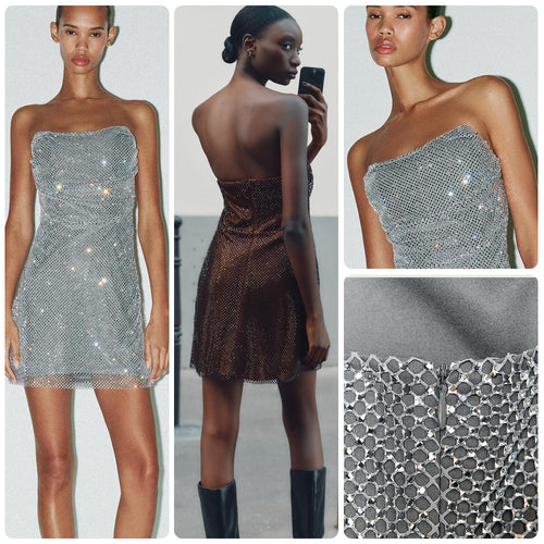 Kvindelig glitrende cocktailkjole med off-shoulder design og glitrende paljetter