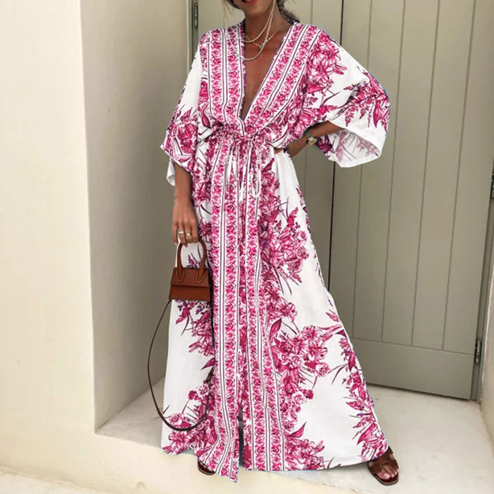 Dame let kaftan med kunstnerisk blomsterdesign og elegante detaljer Stilla